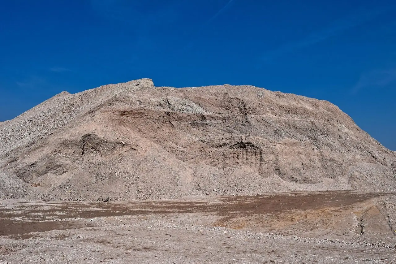 Large pile of sandy fill at a construction site